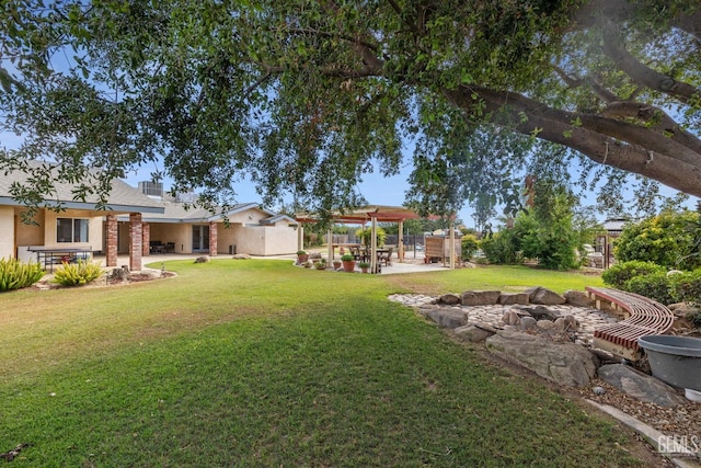 view of yard with a pergola