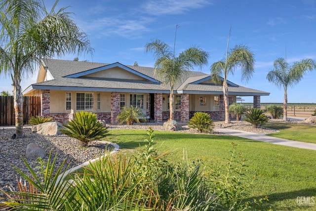 ranch-style house with a front yard