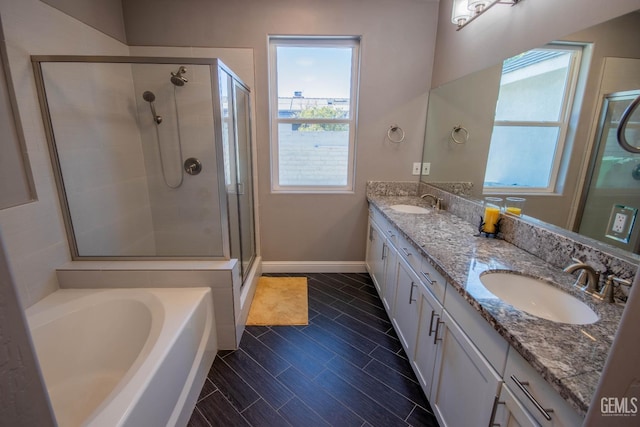 1850 Verdugo Ln, Bakersfield, CA 93312 - bathroom with double vanity, a stall shower, and a garden tub