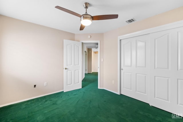 unfurnished bedroom with visible vents, a ceiling fan, a closet, carpet flooring, and baseboards