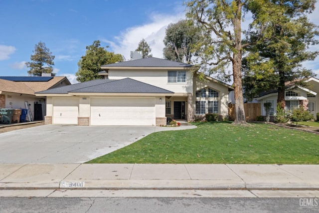 view of front facade with a front lawn, fence, concrete driveway, a garage, and brick siding