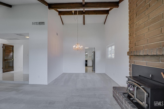 625 Purdy Ct, Bakersfield, CA 93309 - unfurnished living room featuring high vaulted ceiling, beam ceiling, a chandelier, and carpet flooring