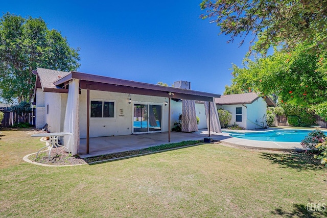 625 Purdy Ct, Bakersfield, CA 93309 - back of property featuring a patio area, an outbuilding, and stucco siding