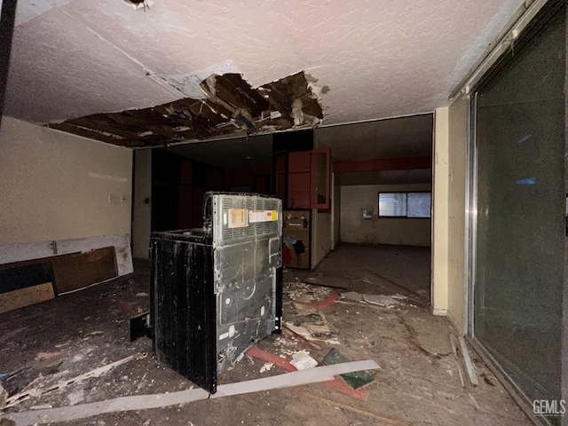 interior space featuring a textured ceiling