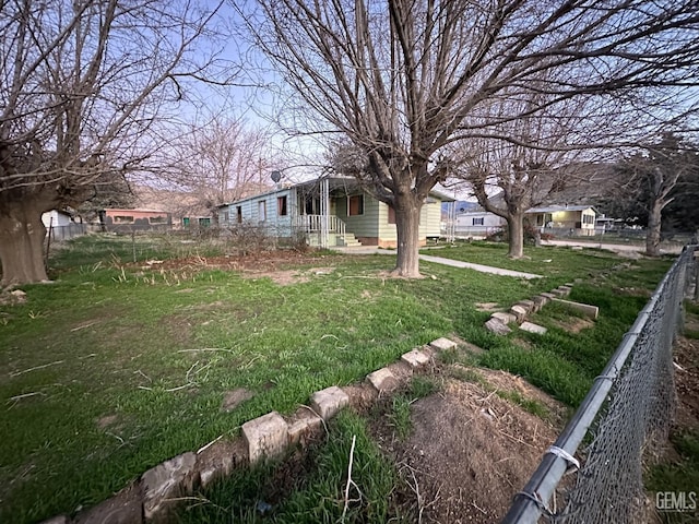 view of yard featuring fence