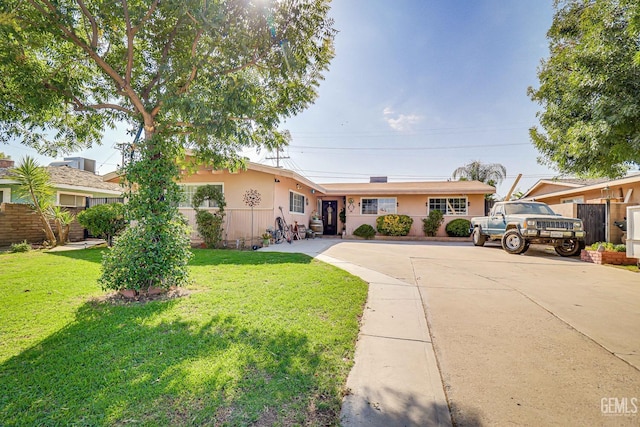 ranch-style house with a front yard