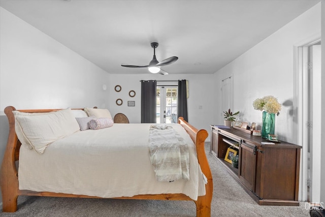 bedroom featuring light carpet, french doors, access to exterior, and ceiling fan