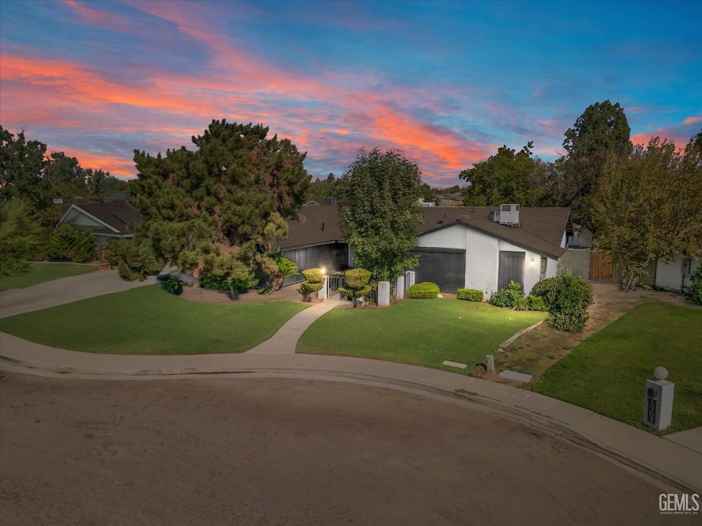 view of front of home with a lawn