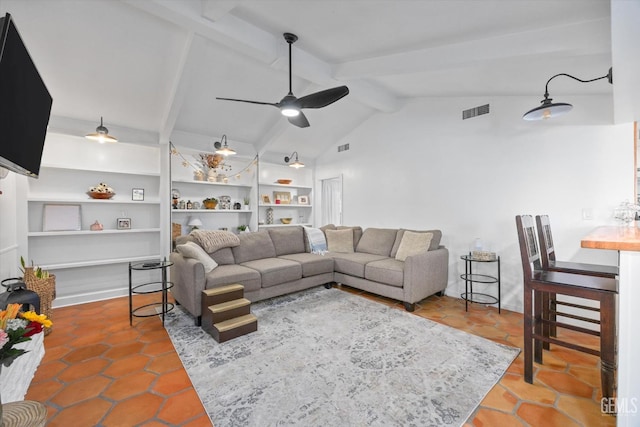 tiled living room featuring vaulted ceiling with beams, ceiling fan, and built in features