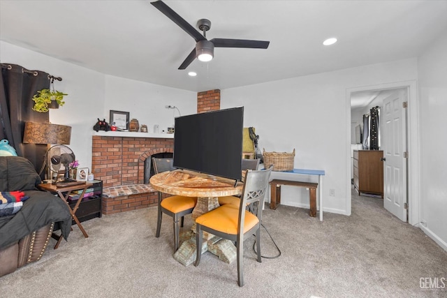 interior space featuring ceiling fan and light colored carpet