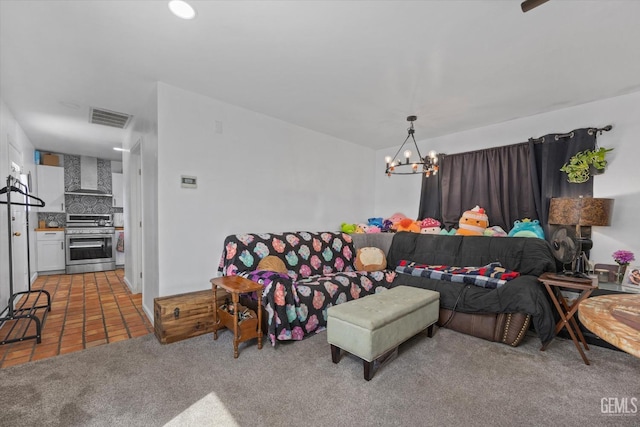 tiled living room with an inviting chandelier