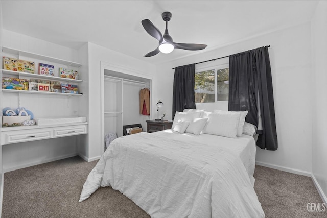 bedroom featuring carpet, ceiling fan, and a closet