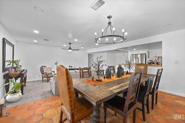 dining area with ceiling fan with notable chandelier