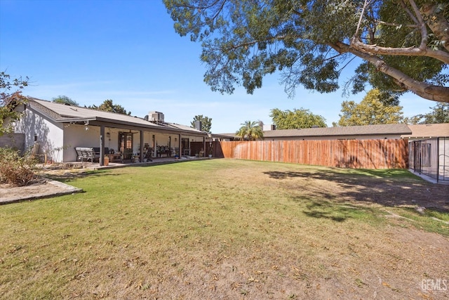 view of yard with a patio area