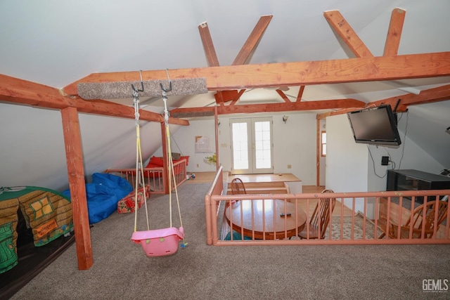 carpeted bedroom with lofted ceiling with beams