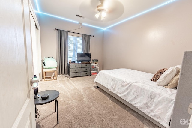 bedroom with ceiling fan, carpet flooring, and visible vents