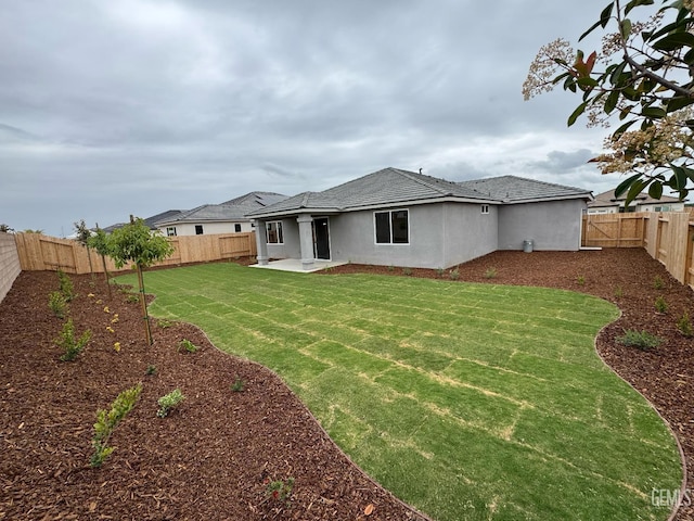11118 Irontooth Ave, Bakersfield, CA 93311 - back of house featuring a patio and stucco siding