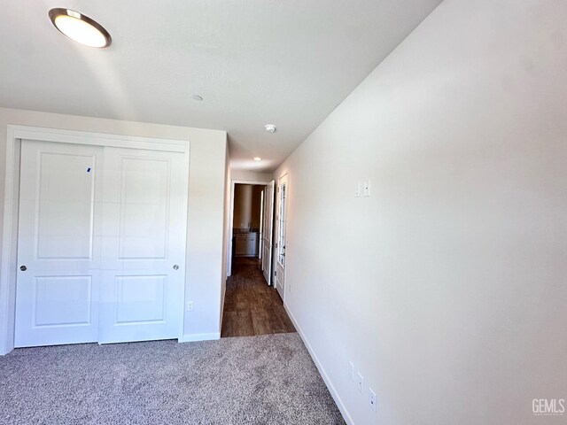 11118 Irontooth Ave, Bakersfield, CA 93311 - unfurnished bedroom with baseboards, a closet, and carpet flooring