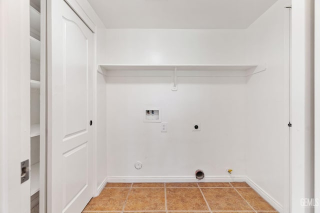 5219 Port Dr, Bakersfield, CA 93312 - laundry area featuring hookup for a gas dryer, hookup for a washing machine, hookup for an electric dryer, and light tile patterned flooring