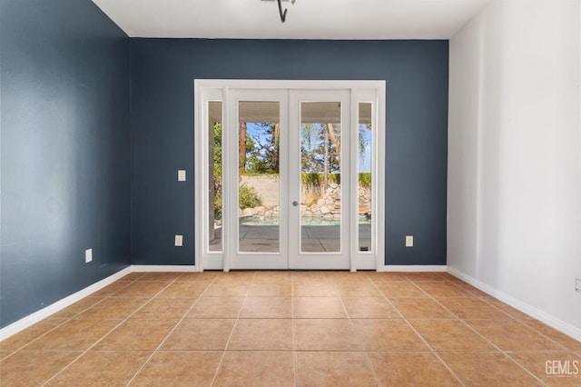 5219 Port Dr, Bakersfield, CA 93312 - doorway with french doors and light tile patterned flooring