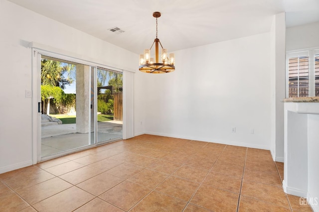 5219 Port Dr, Bakersfield, CA 93312 - empty room with a chandelier and light tile patterned flooring