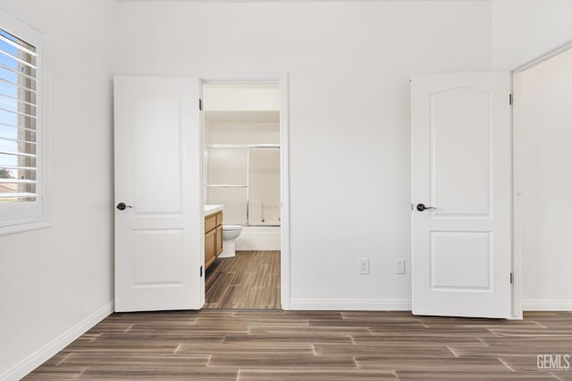 5219 Port Dr, Bakersfield, CA 93312 - unfurnished bedroom featuring wood finished floors and connected bathroom