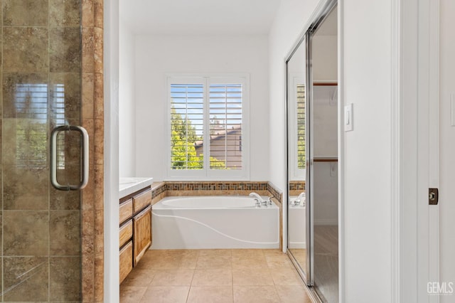 5219 Port Dr, Bakersfield, CA 93312 - bathroom with a shower stall, vanity, a bath, and tile patterned floors