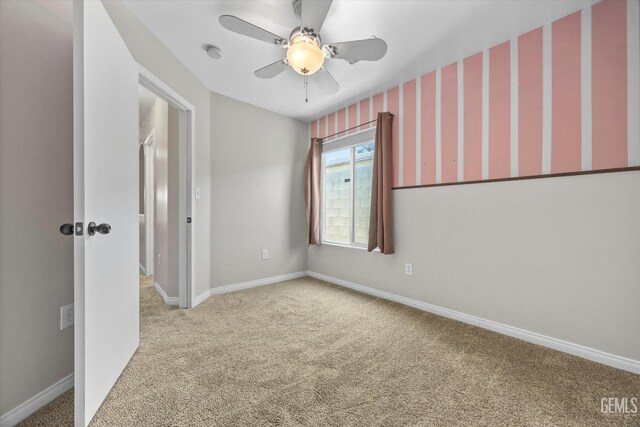 3601 Villa Lante St, Bakersfield, CA 93308 - empty room with carpet floors, a smoke detector, and ceiling fan