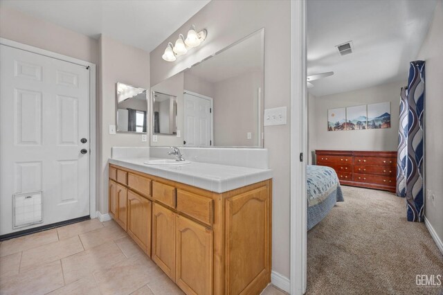 3601 Villa Lante St, Bakersfield, CA 93308 - ensuite bathroom featuring vanity and baseboards