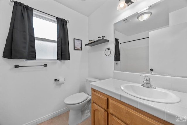 3601 Villa Lante St, Bakersfield, CA 93308 - bathroom with vanity, a shower with shower curtain, and tile patterned floors