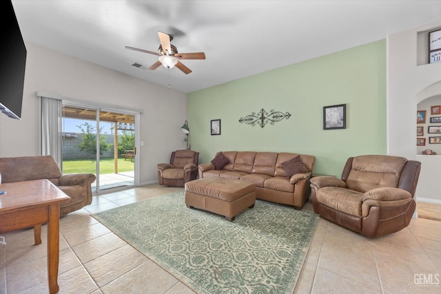 3601 Villa Lante St, Bakersfield, CA 93308 - living area with a ceiling fan, light tile patterned floors, and arched walkways