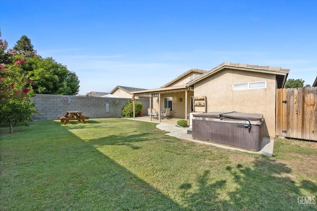 3601 Villa Lante St, Bakersfield, CA 93308 - fenced backyard featuring a hot tub and a patio area