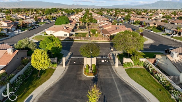 drone / aerial view with a mountain view and a residential view