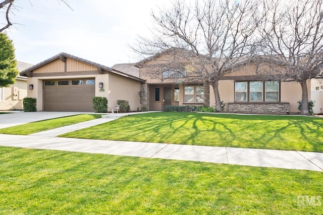 view of front of house with a garage and a front yard