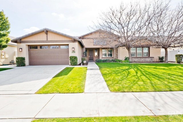 ranch-style home with a garage and a front yard