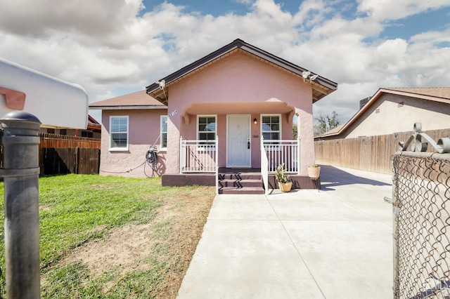 814 Eureka St, Bakersfield, CA 93305 - view of front of home featuring a porch and stucco siding