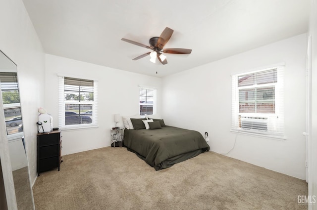 814 Eureka St, Bakersfield, CA 93305 - carpeted bedroom with a ceiling fan
