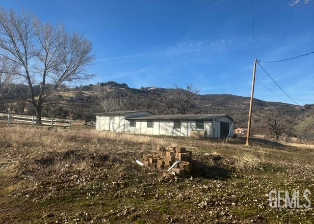 property view of mountains with a rural view