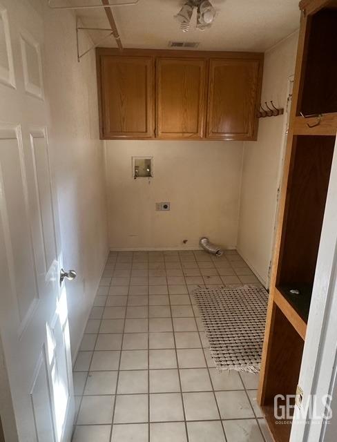 utility room with heating unit and strapped water heater