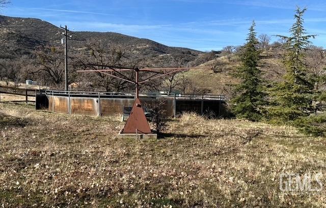 view of property exterior featuring a mountain view