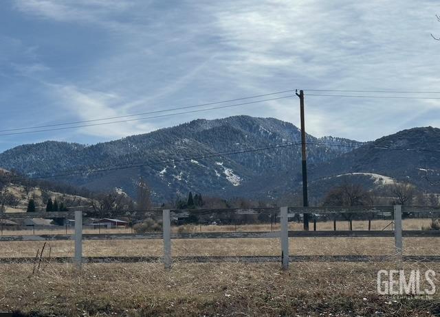 property view of mountains featuring a rural view