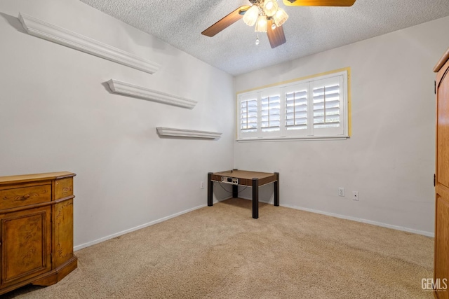 3504 Elm St, Bakersfield, CA 93301 - unfurnished room with a ceiling fan, a textured ceiling, carpet, and baseboards