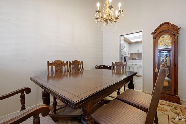 3504 Elm St, Bakersfield, CA 93301 - dining room featuring a chandelier