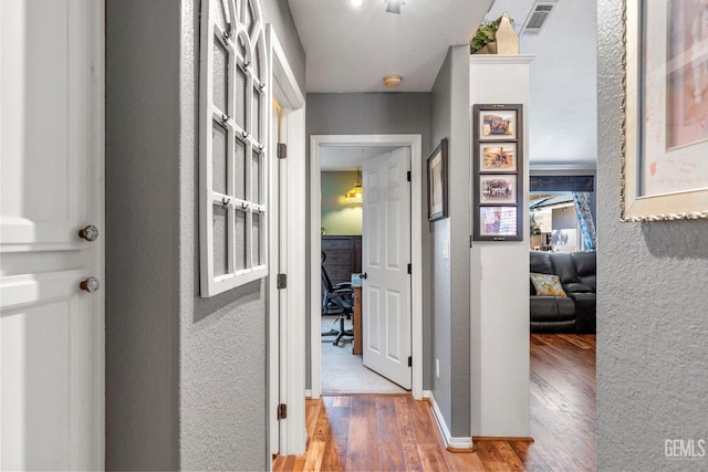 hall featuring hardwood / wood-style flooring