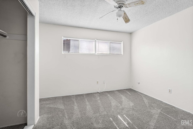 6201 Hartman Ave, Bakersfield, CA 93309 - unfurnished bedroom featuring carpet flooring, a textured ceiling, ceiling fan, and a closet