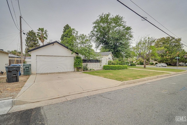 2849 Alturas Dr, Bakersfield, CA 93305 - view of front facade with stucco siding, driveway, a front yard, and a garage