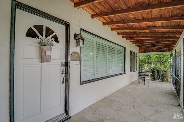 2849 Alturas Dr, Bakersfield, CA 93305 - view of exterior entry with stucco siding and a porch