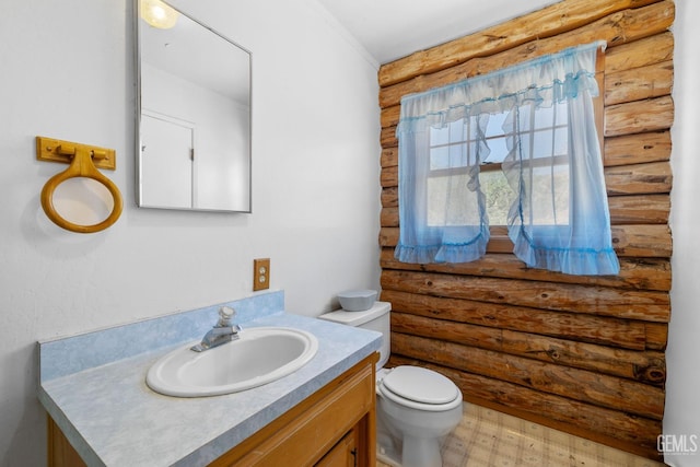 38579 Payne Way, Caliente, CA 93518 - bathroom with log walls, vanity, and toilet