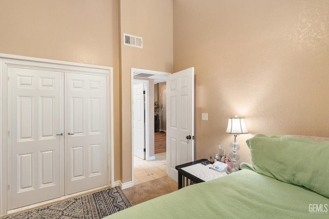 7800 Westfield Rd Unit 28, Bakersfield, CA 93309 - bedroom featuring light colored carpet, a closet, and a high ceiling