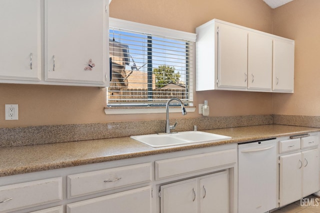 7800 Westfield Rd Unit 28, Bakersfield, CA 93309 - kitchen featuring white dishwasher, white cabinets, and light countertops